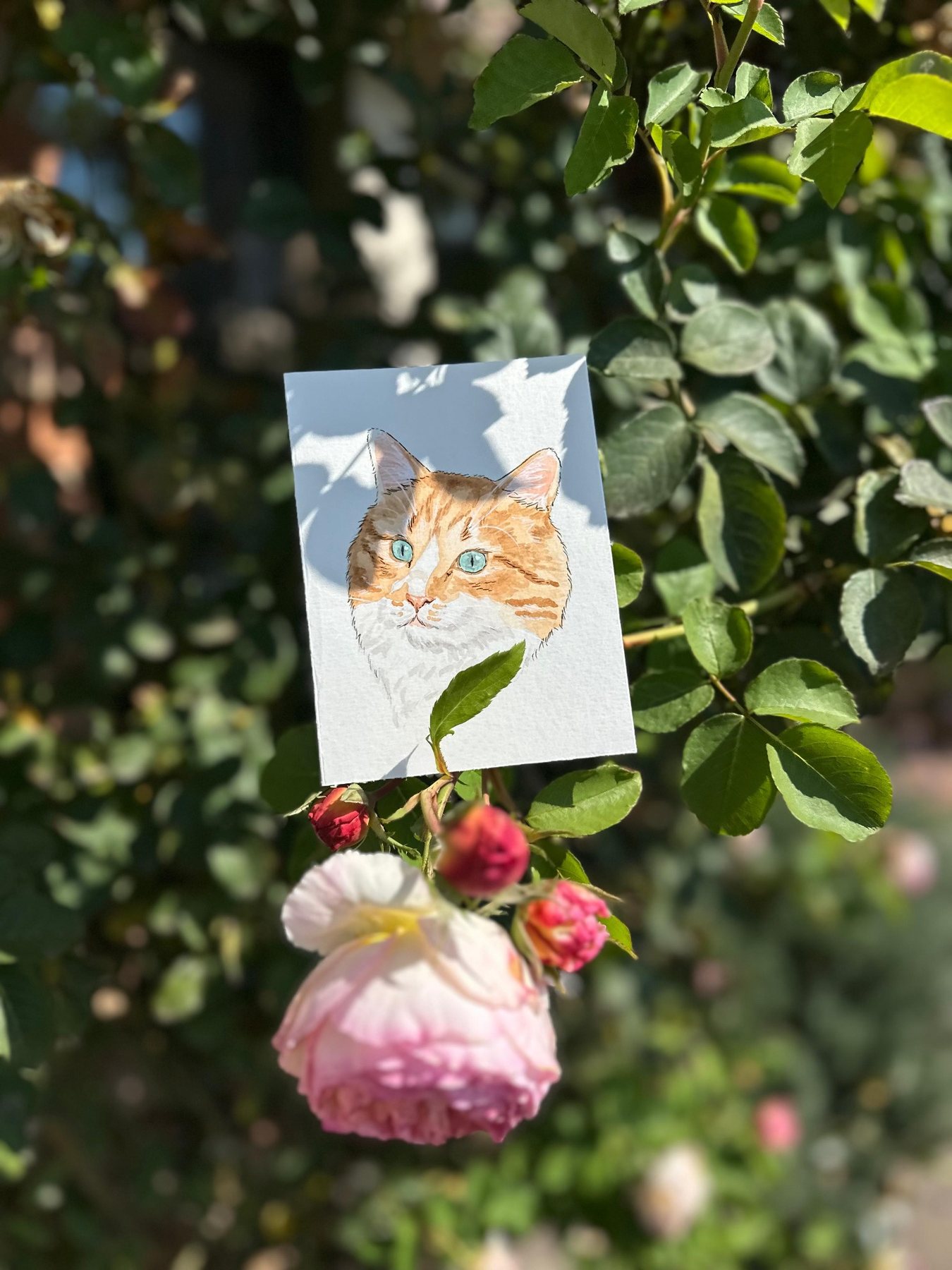 Illustrated portrait of a ginger cat with blue eyes among leaves